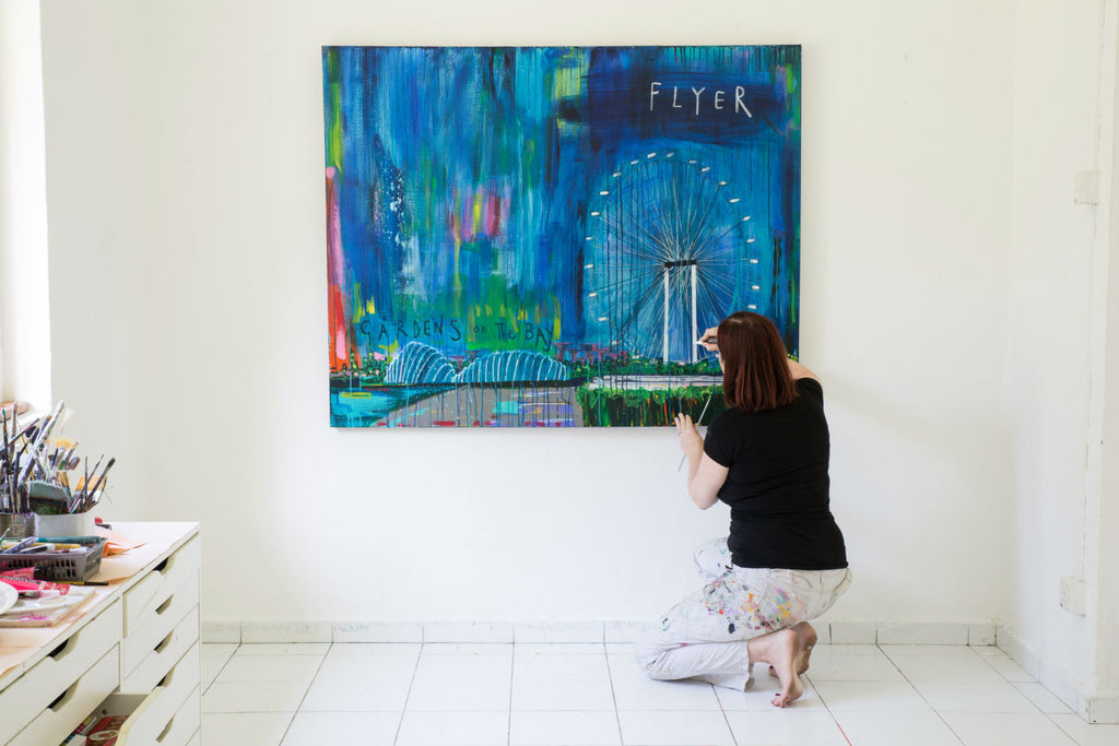 Artist Clare Haxby and her Flyer By Gardens On The Bay Original Painting